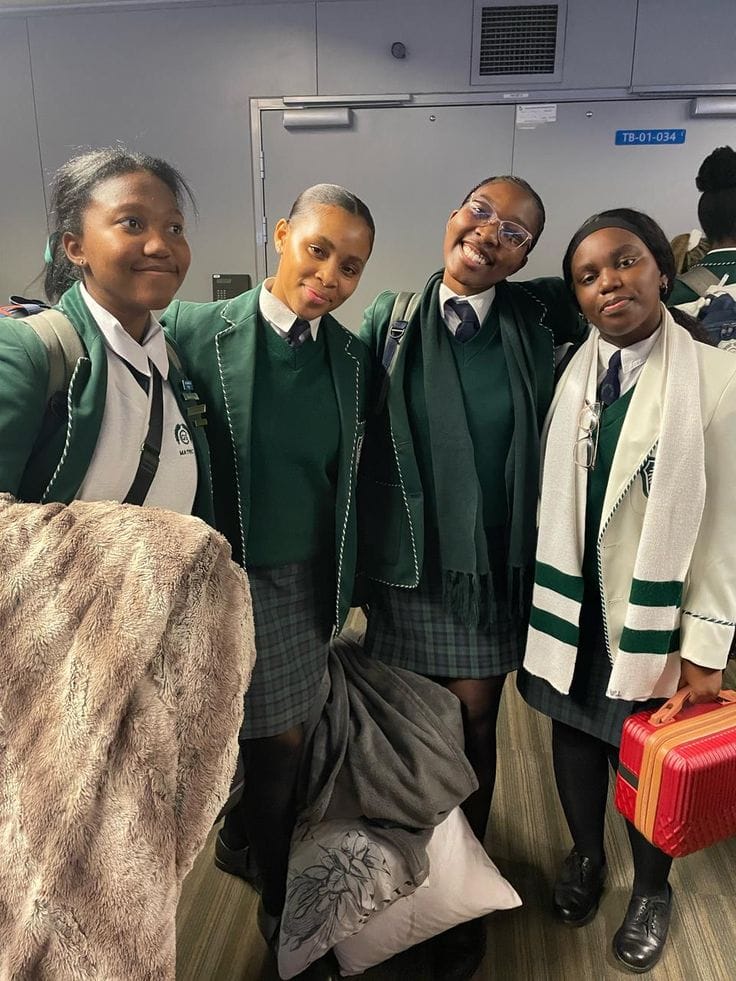Girls in green school uniforms